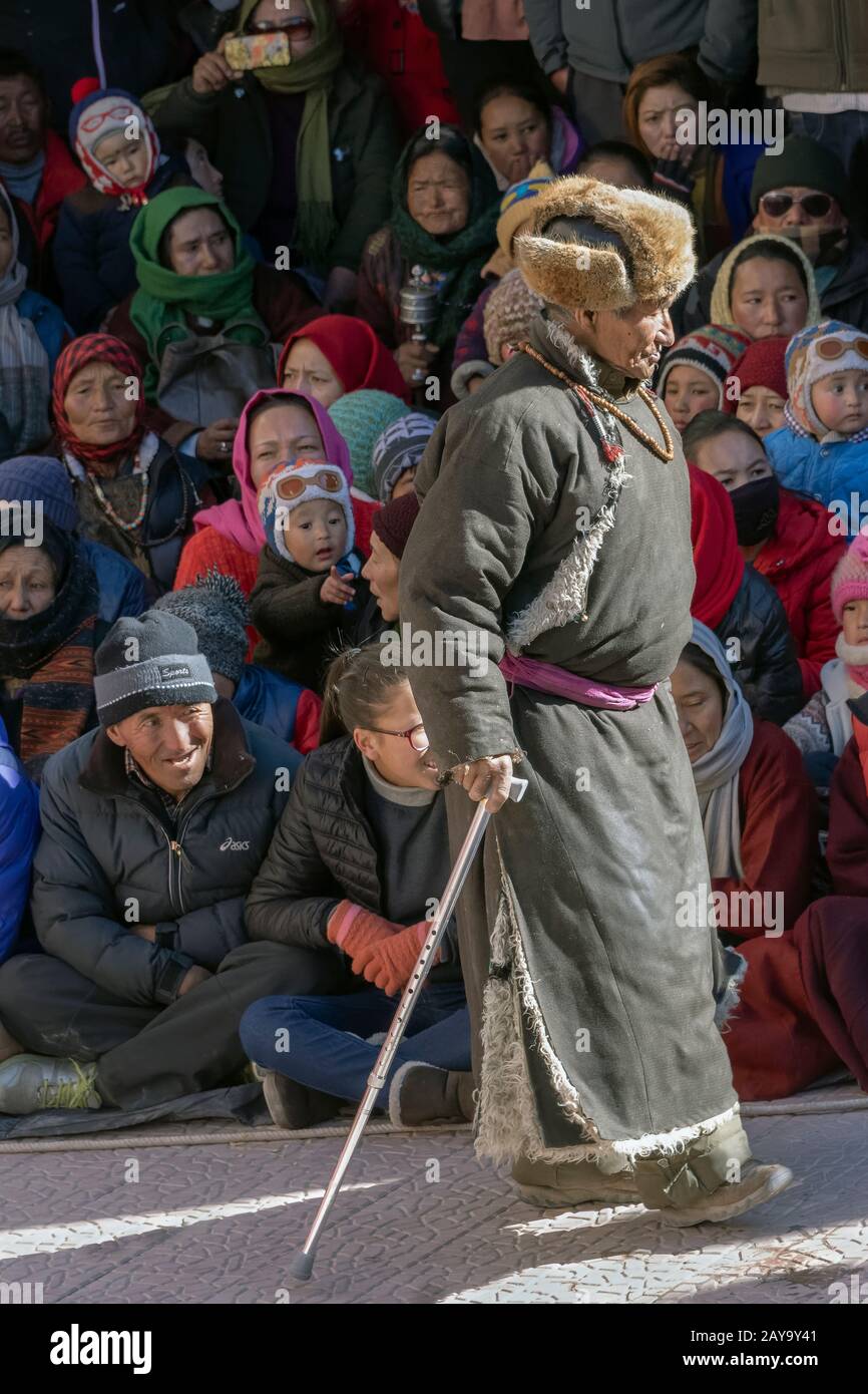 Elderly man in traditional fur hat and sheepskin coat, Gustor festival, Spituk Gompa, Leh, Ladakh Stock Photo