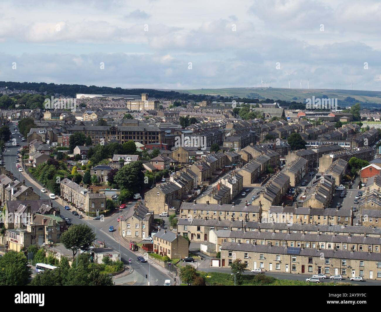 panoramic view of Halifax in west yorkshire with rows of terraced streets buildings and roads Stock Photo