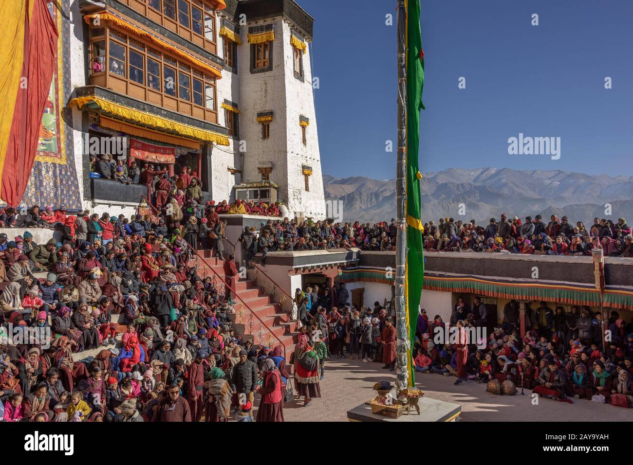 Crowds gather around the courtyard for the Gustor festival, Spituk Gompa, Leh, Ladakh Stock Photo