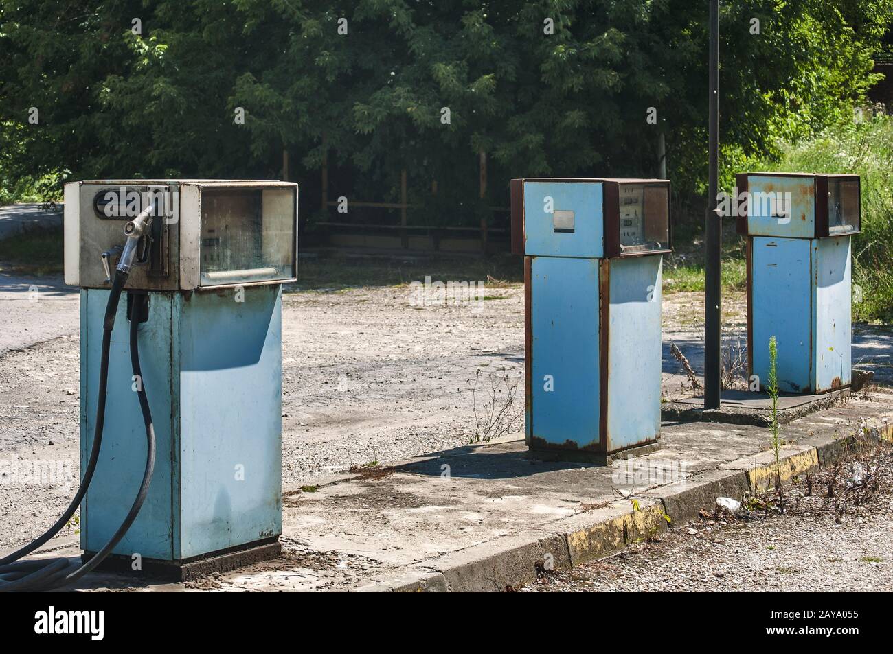 Old abandoned vintage obsolete petrol fuel gas dispenser in former