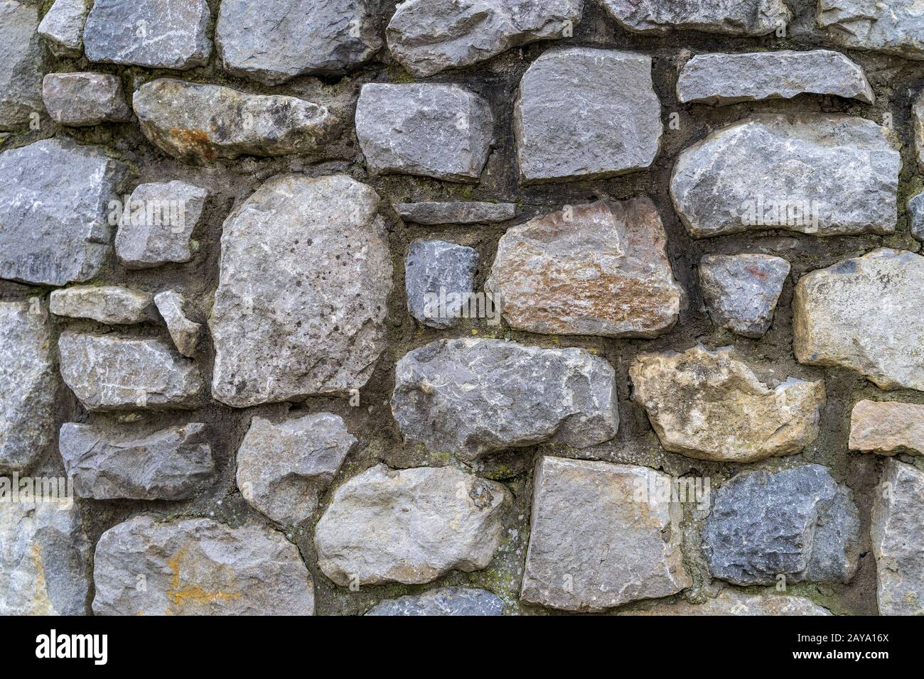 Old rustic stone wall High quality texture and background Stock Photo