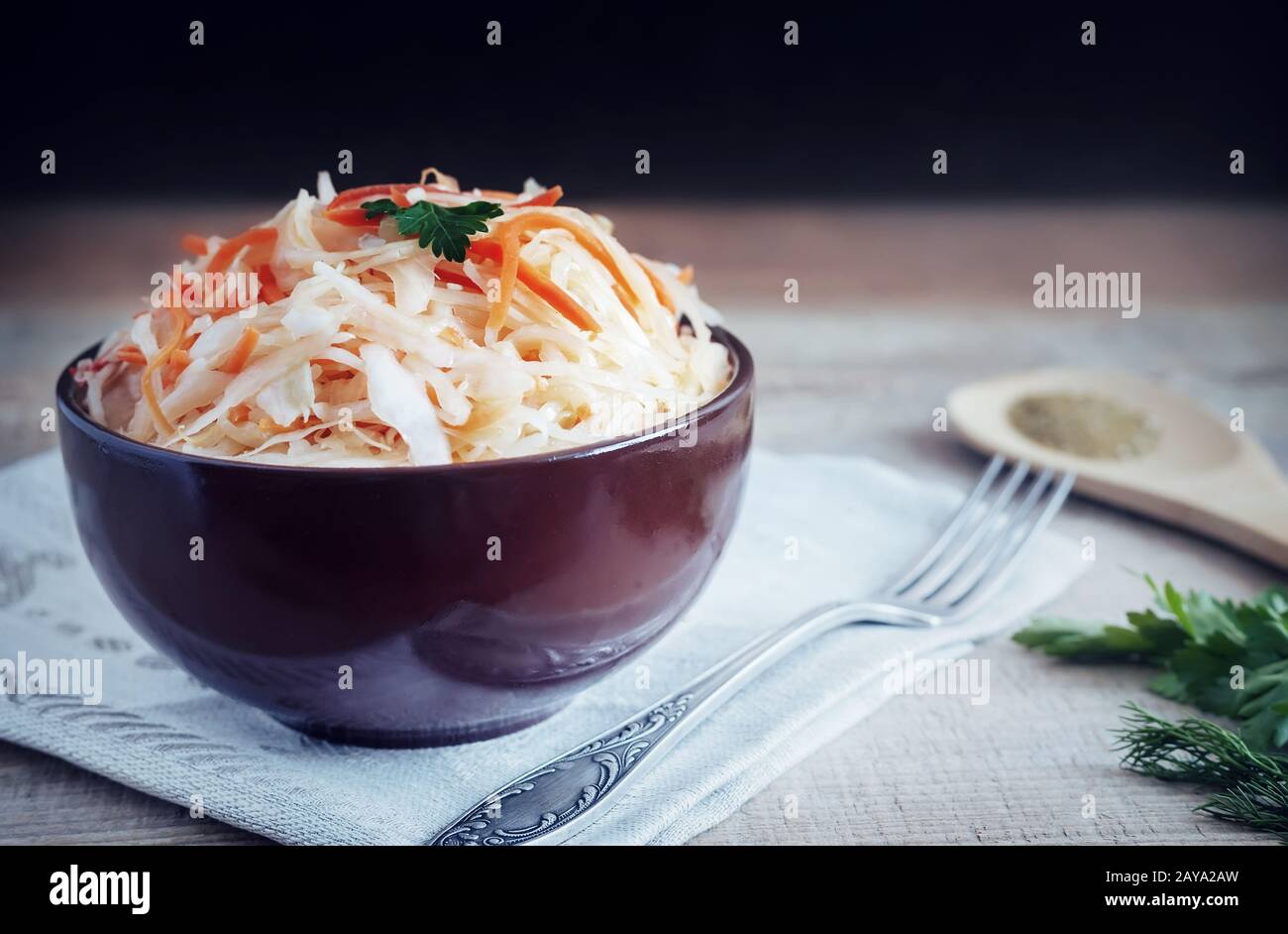 Sauerkraut with carrots in a ceramic Cup. Stock Photo
