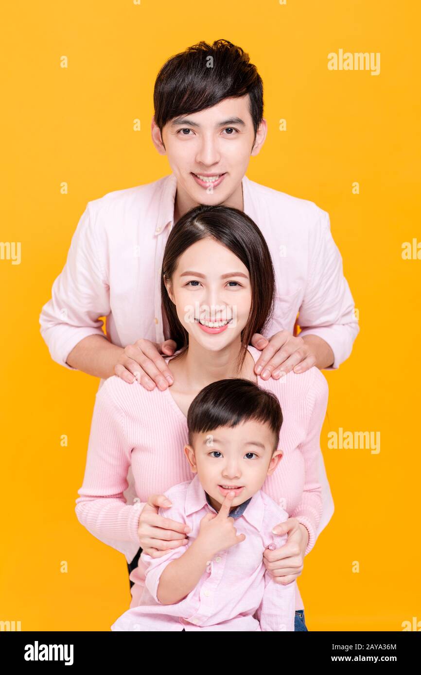 Happy young family with pretty child Stock Photo