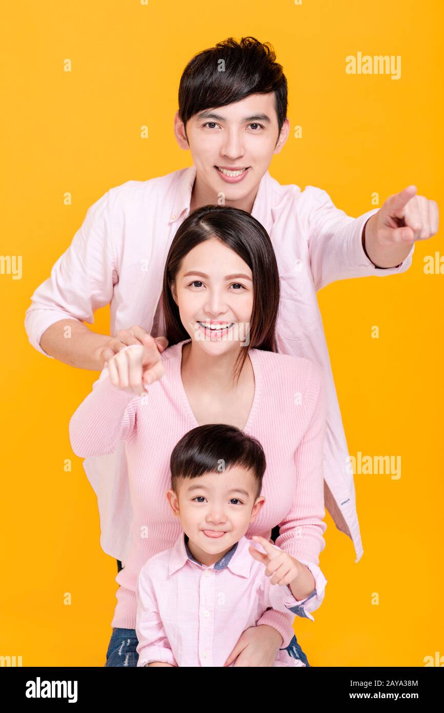 Happy young family with pretty child Stock Photo