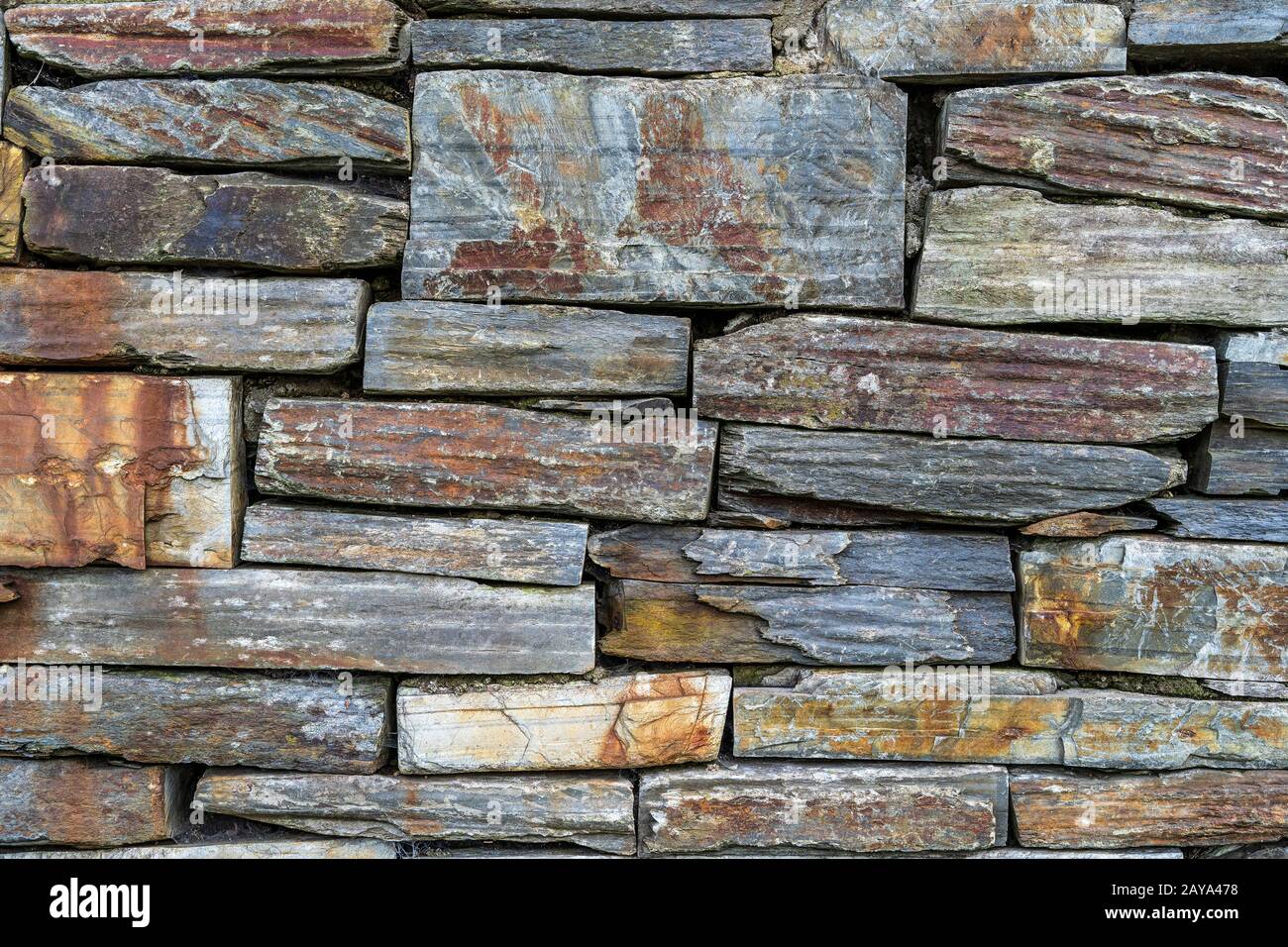 Old rustic stone wall High quality texture and background Stock Photo