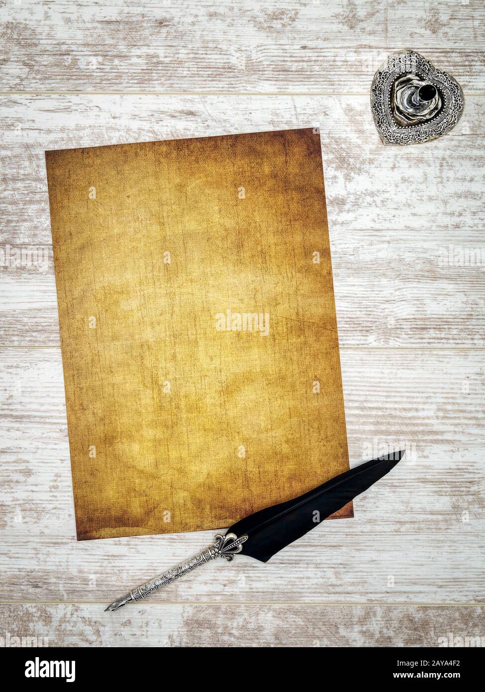 Antique blank preachment with ornate quill and quill stand Stock Photo