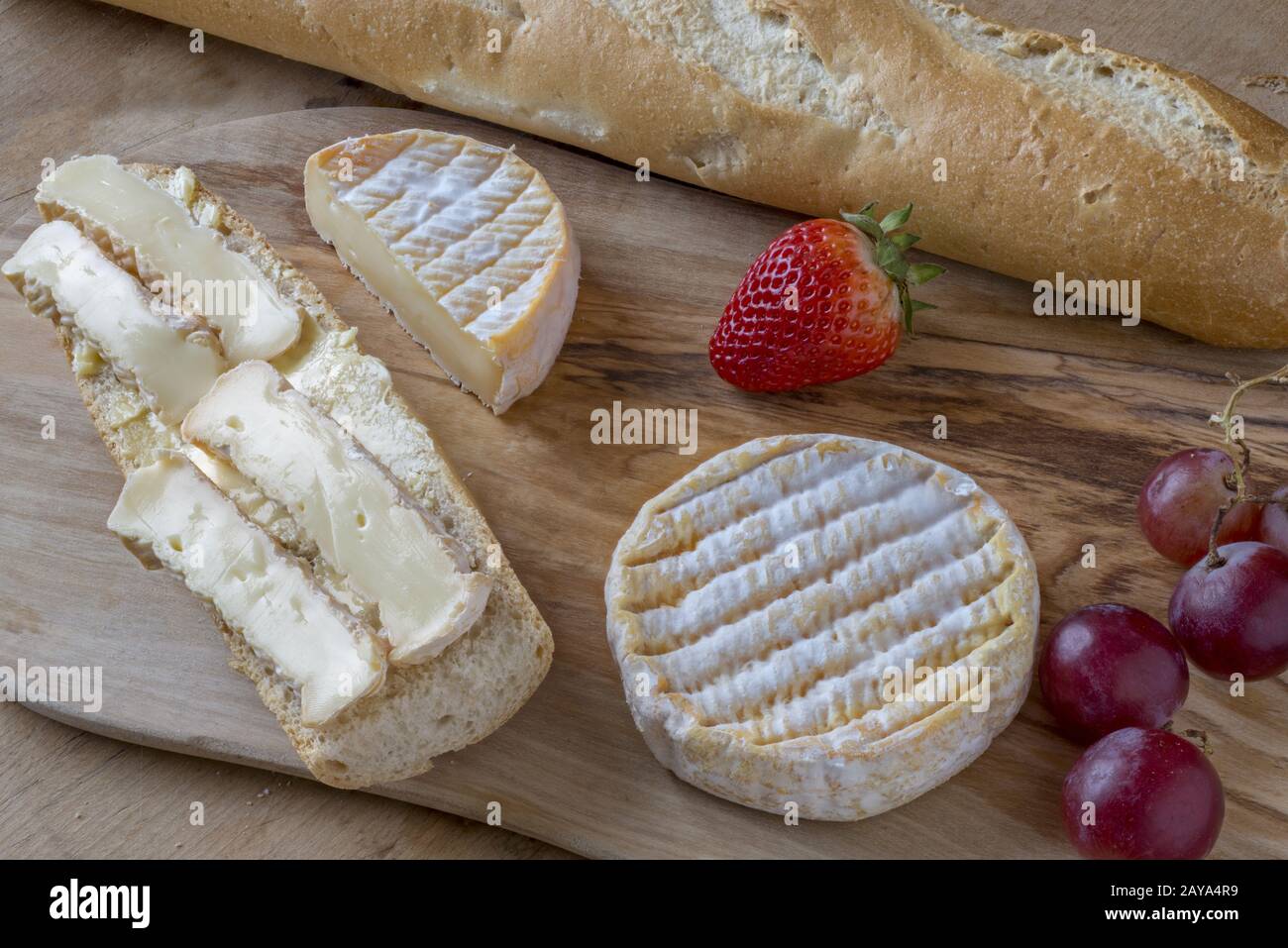 French cheese vespers with fresh baguette Stock Photo