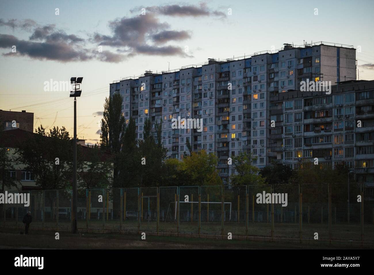 October 4, 2018. Ghetto architecture the collapse of the Soviet Union. Echo of the USSR. Country high-rise houses in the evening Stock Photo