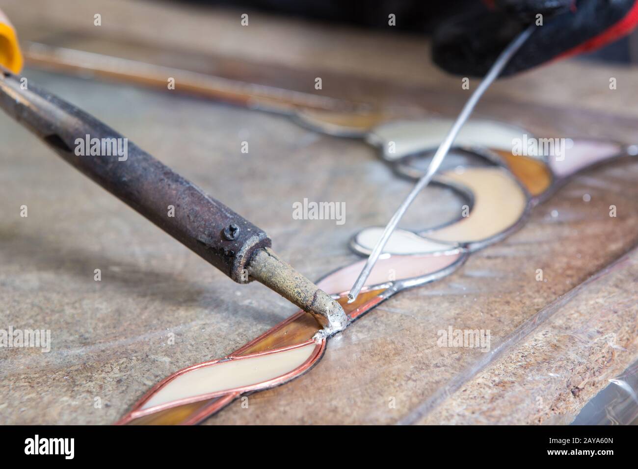 Stained glass maker works with souvenirs Stock Photo Alamy