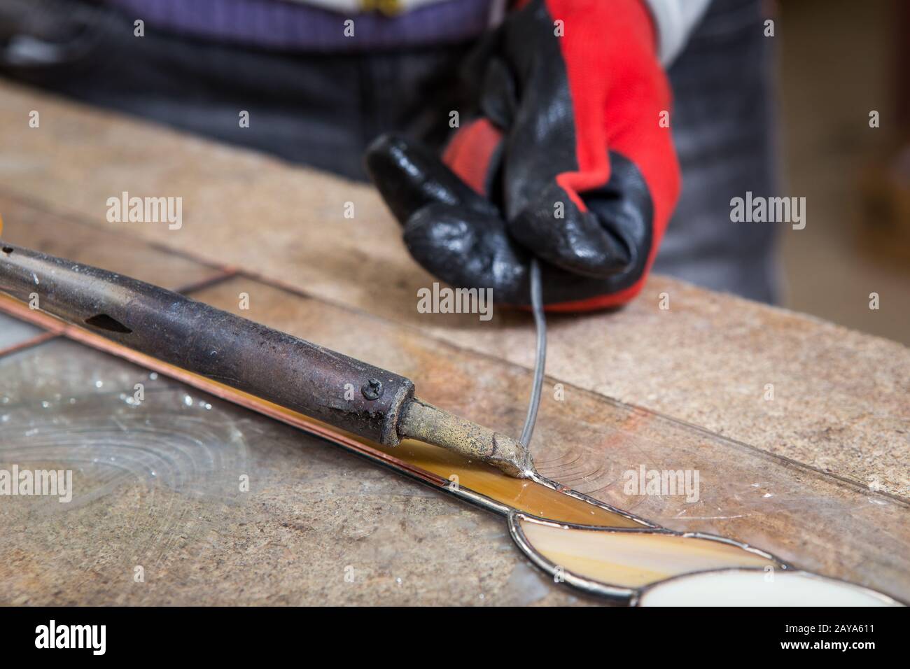 Stained glass maker works with souvenirs Stock Photo Alamy