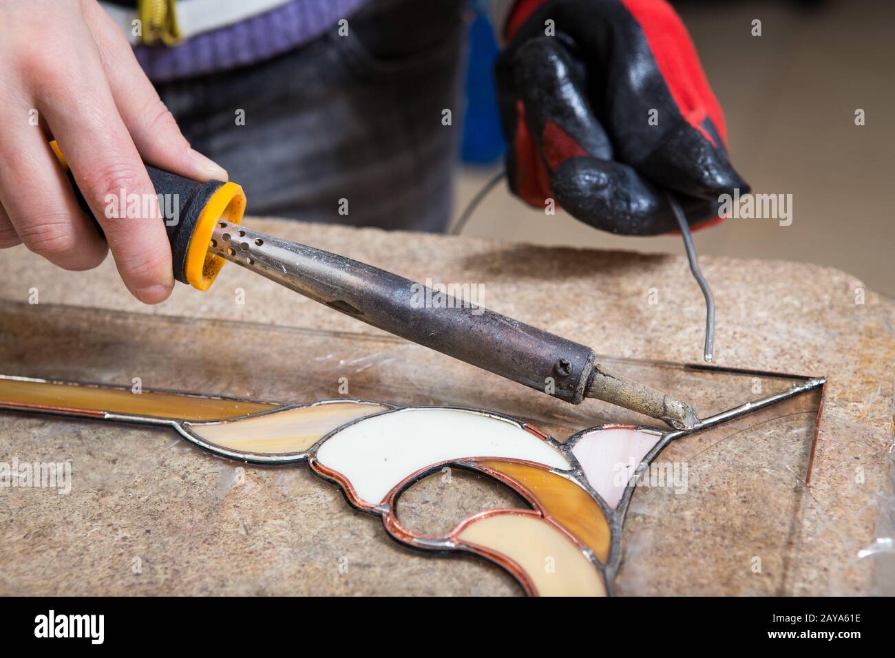 Stained glass maker works with souvenirs Stock Photo Alamy