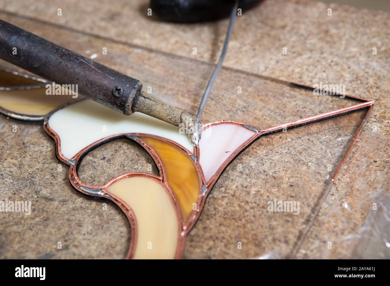 Stained glass maker works with souvenirs Stock Photo Alamy