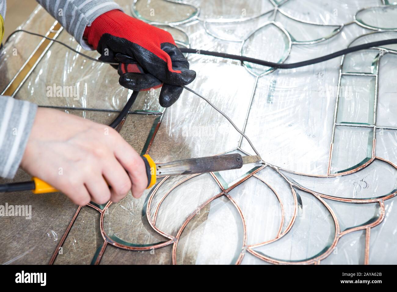 Stained glass maker works with souvenirs Stock Photo Alamy