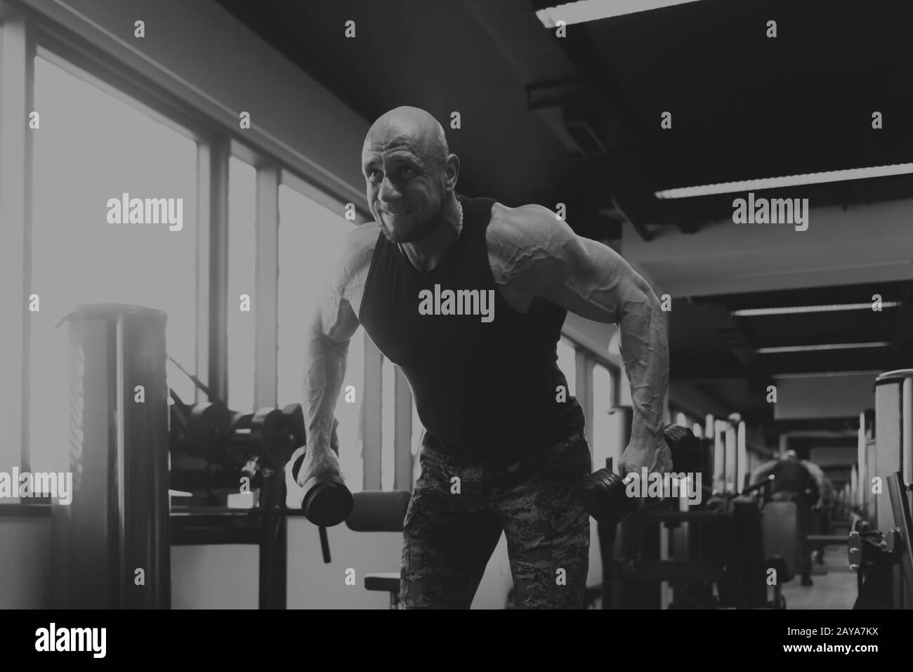 Shoulder muscles exercise Black and White Stock Photos & Images - Alamy