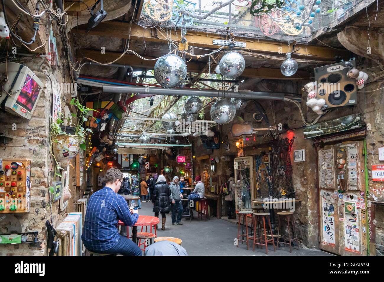 Budapest, Hungary - February 2020: Szimpla Garden ruin bar / pub with visitors - a popular spot for locals and tourists in Budapest Stock Photo