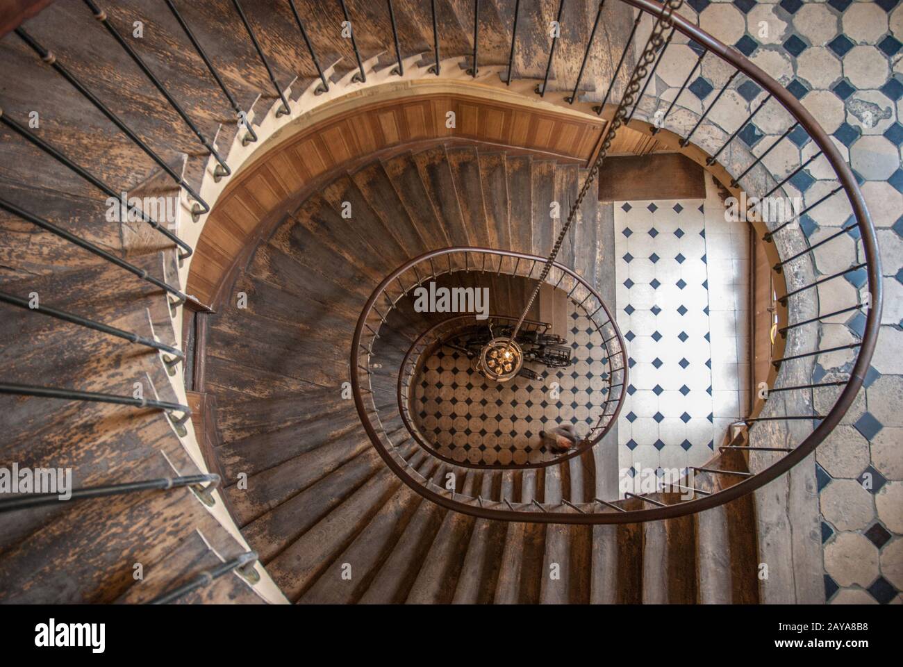 Paris, France - August 05, 2006: Beautiful vintage high spiral staircase in the gallery of Vivienne. Top view Stock Photo