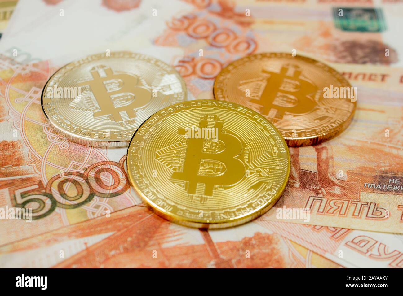 Close-up of Bitcoin coins on 5000 Russian rubles banknote. Crypto currency  BTC Stock Photo - Alamy