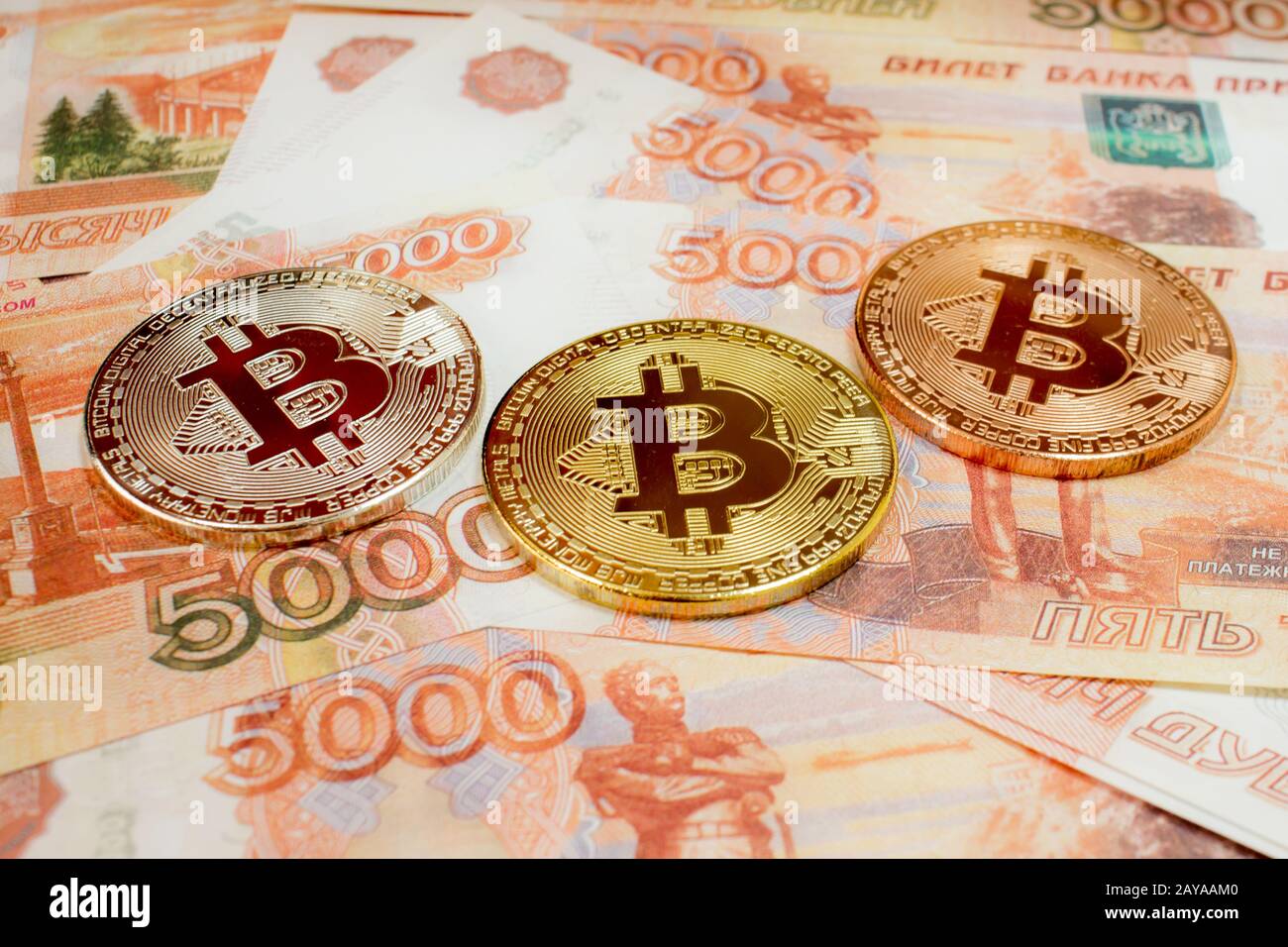 Close-up of Bitcoin coins on 5000 Russian rubles banknote. Crypto currency  BTC Stock Photo - Alamy