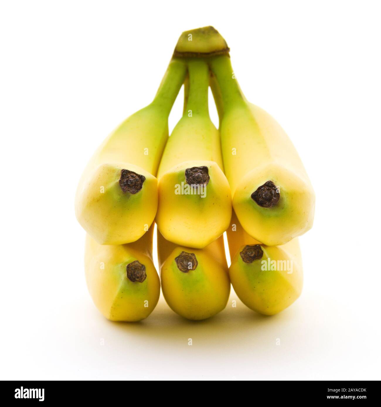 Perfect bananas with yellow and green color isolated on white background. Sports food and nutrition Stock Photo