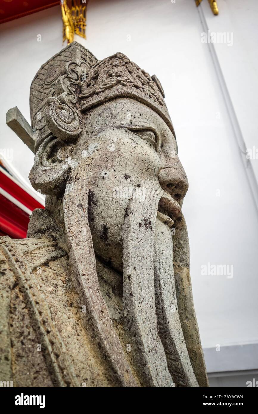 Chinese Guard statue in Wat Pho, Bangkok, Thailand Stock Photo