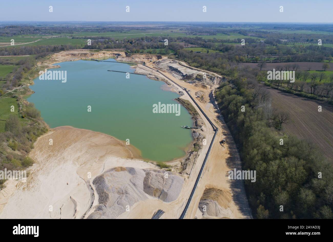 Gravel quarrying in a gravel pit during a drone flight Stock Photo