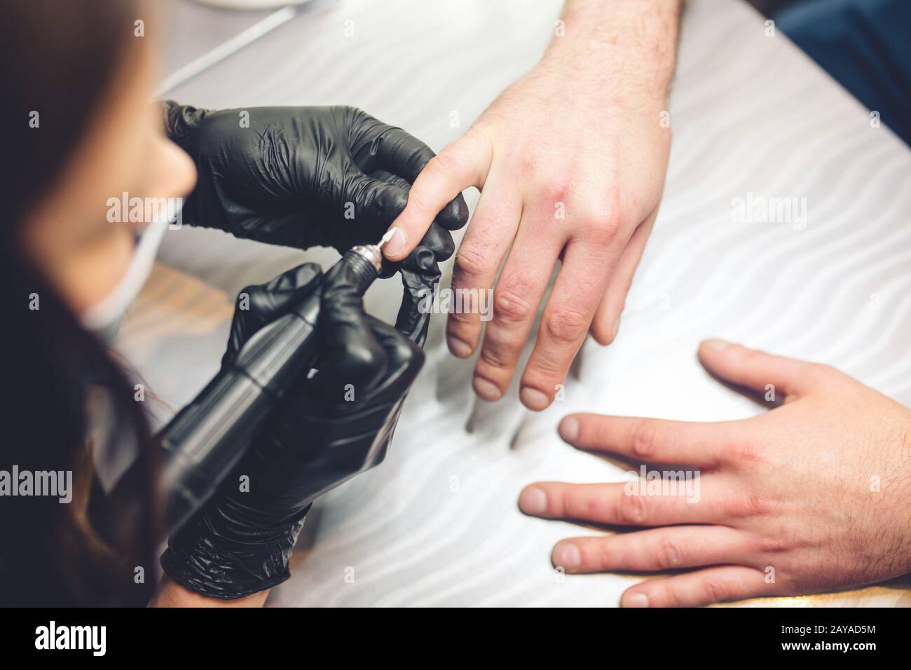 Men S Manicure Professional Manicure For Man By Manicure Machine A Man Receiving A Manicure In