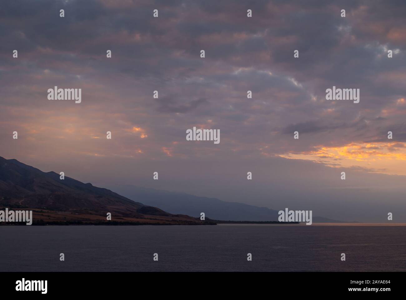 Lahaina, Maui, Hawaii, USA. - January 12 2012: Early morning light over ocean while approacing West side on dark ocean under spectacular cloudscape as Stock Photo