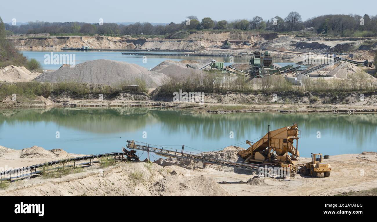 Gravel quarrying in a gravel pit during a drone flight Stock Photo