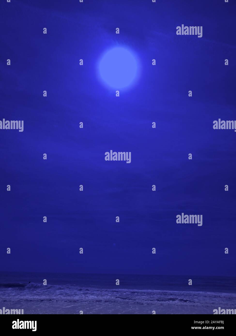 Full moon over water Stock Photo - Alamy