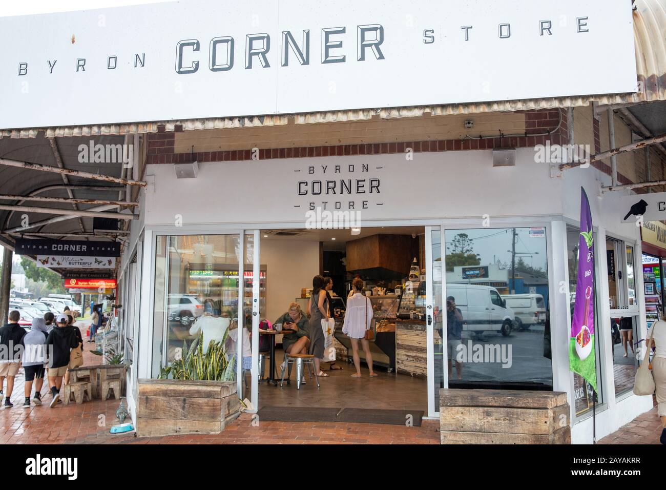 Byron Bay corner store retail shop in Byron Bay town centre on a summers day,Australia customers queue for items Stock Photo