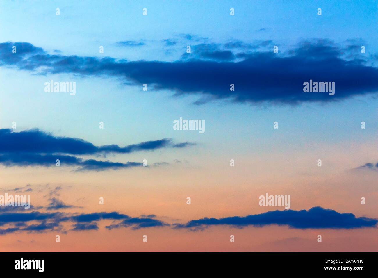 orange sunset sky with clouds. beautiful nature background Stock Photo ...