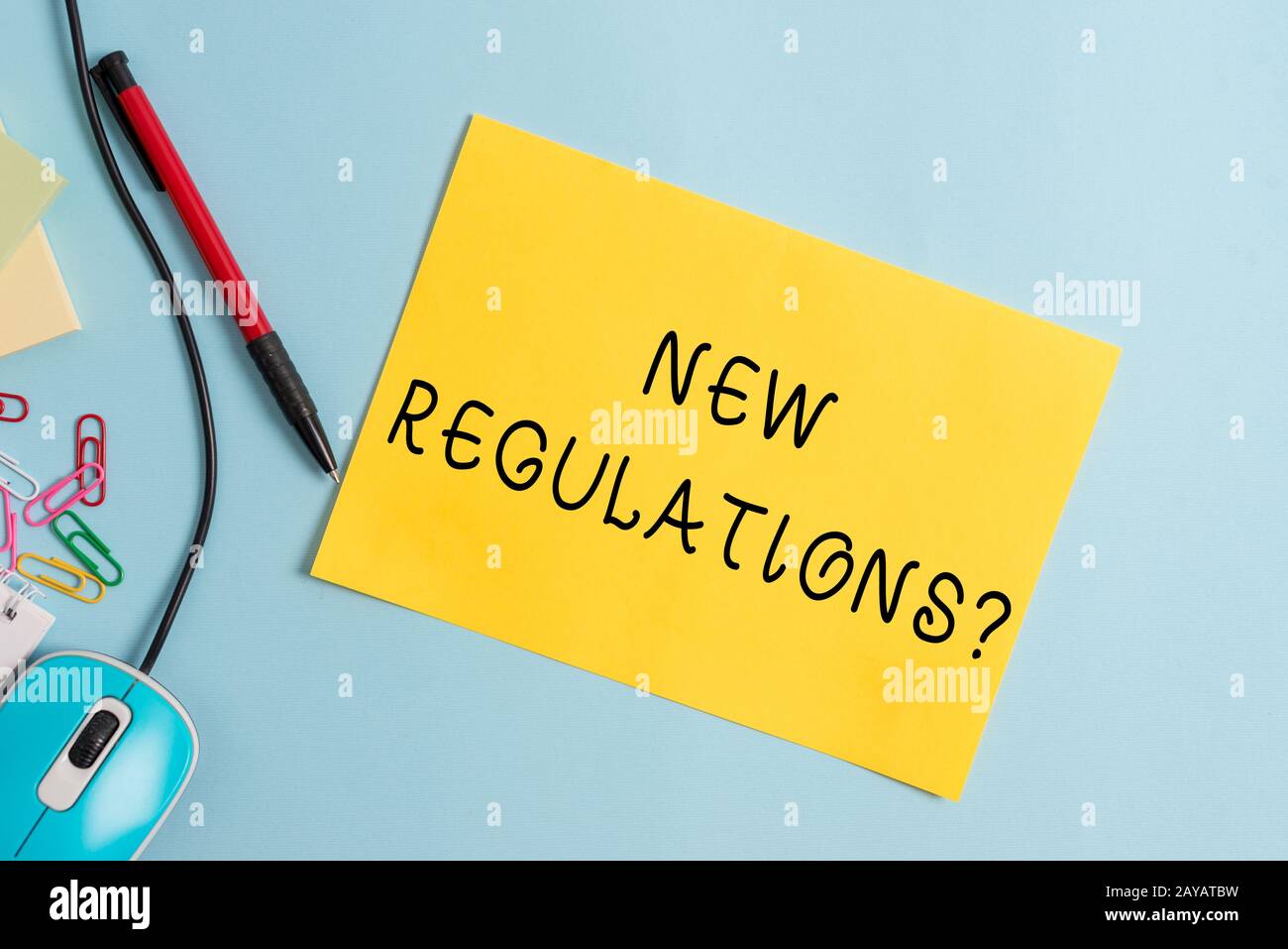 Handwriting text writing New Regulations Question. Concept meaning