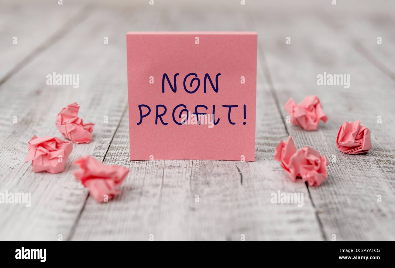 Handwriting text writing Non Profit. Concept meaning not making or conducted primarily to make profit organization Thick set of Stock Photo