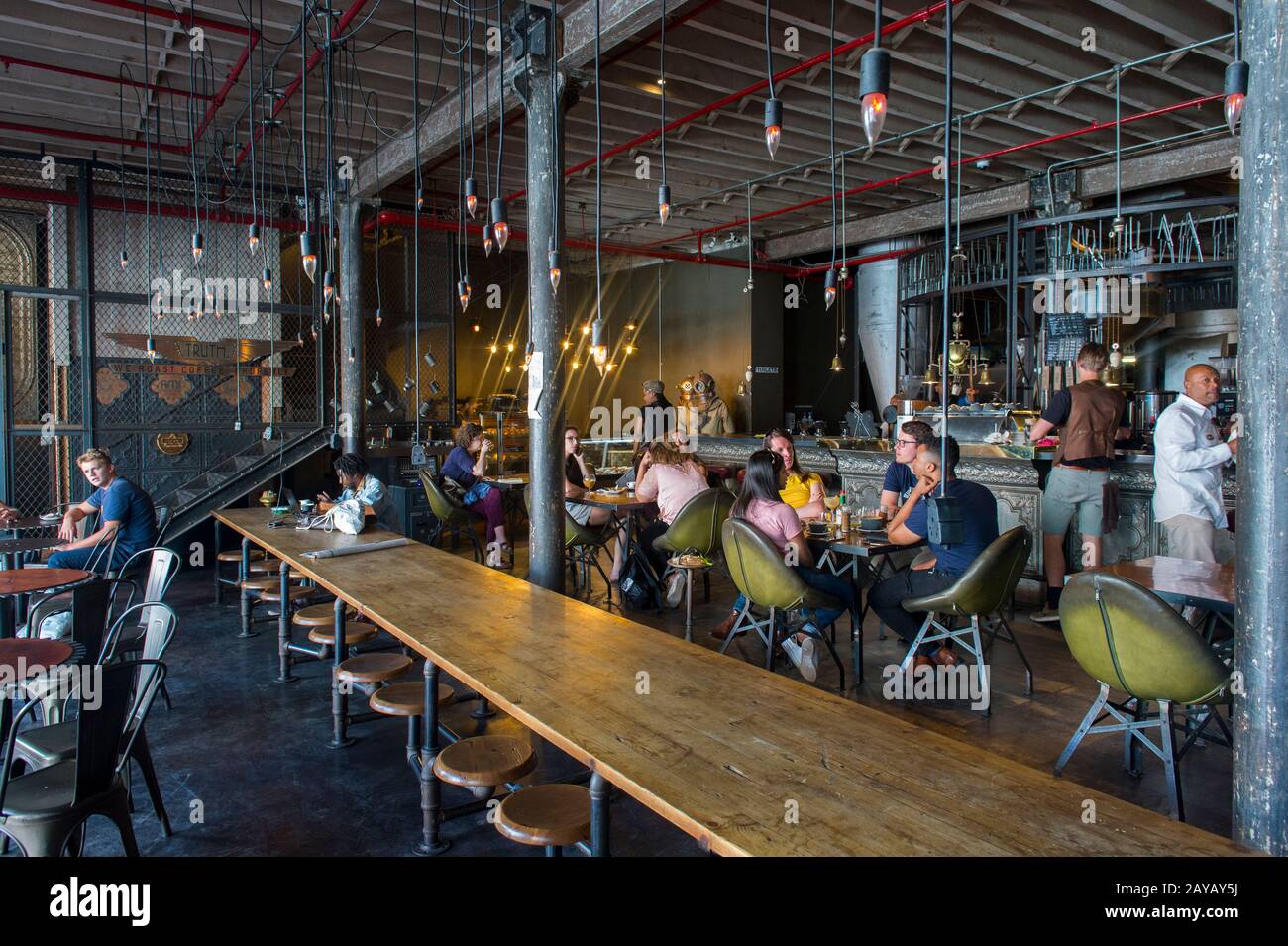 The Interior Of The Truth Coffee Shop With Vintage Decorations In