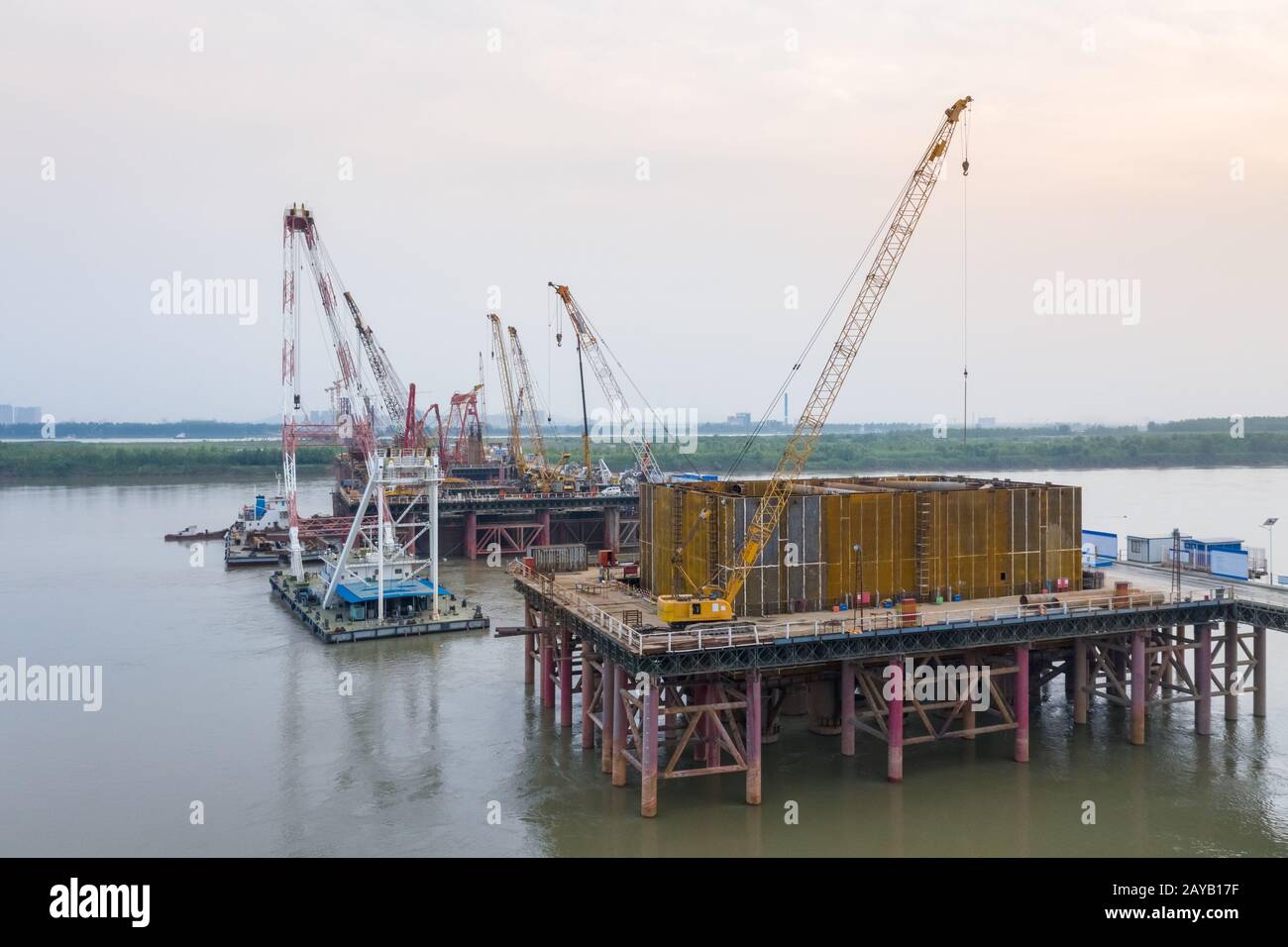 cranes on bridge construction site Stock Photo