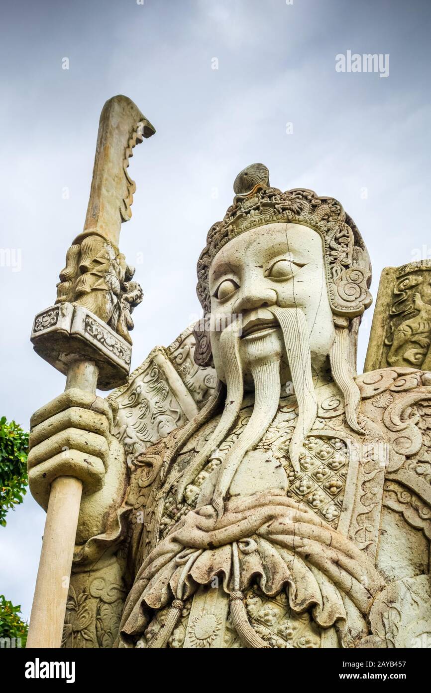 Chinese Guard statue in Wat Pho, Bangkok, Thailand Stock Photo