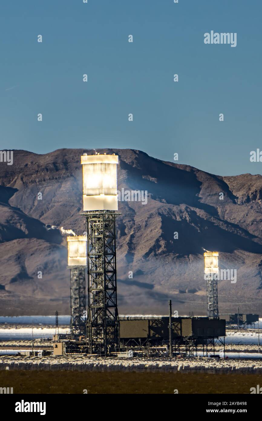 Solar heliostat concentrating the sun's rays to produce electricity in nevada Stock Photo