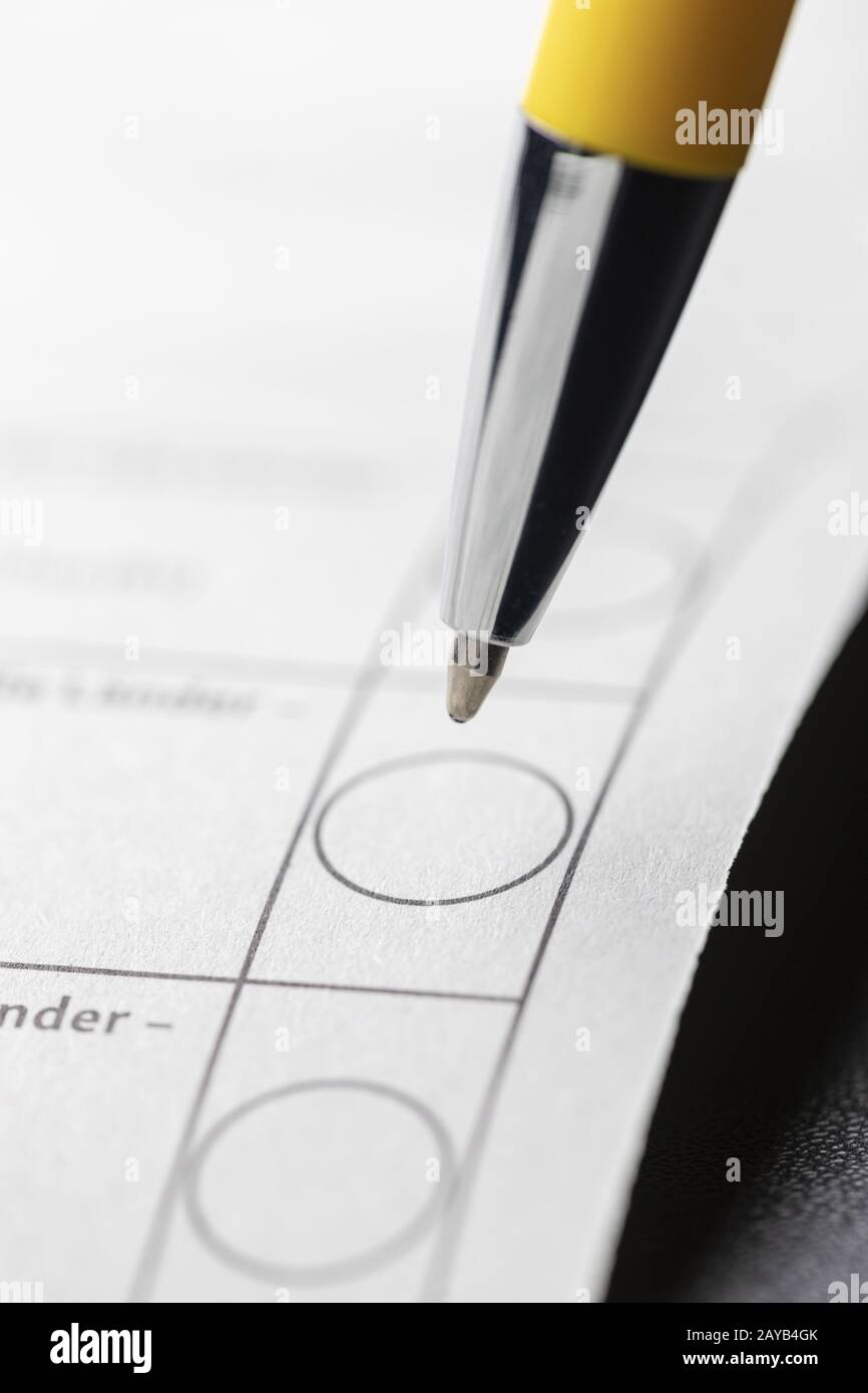 Close-up of a pen on a ballot paper Stock Photo