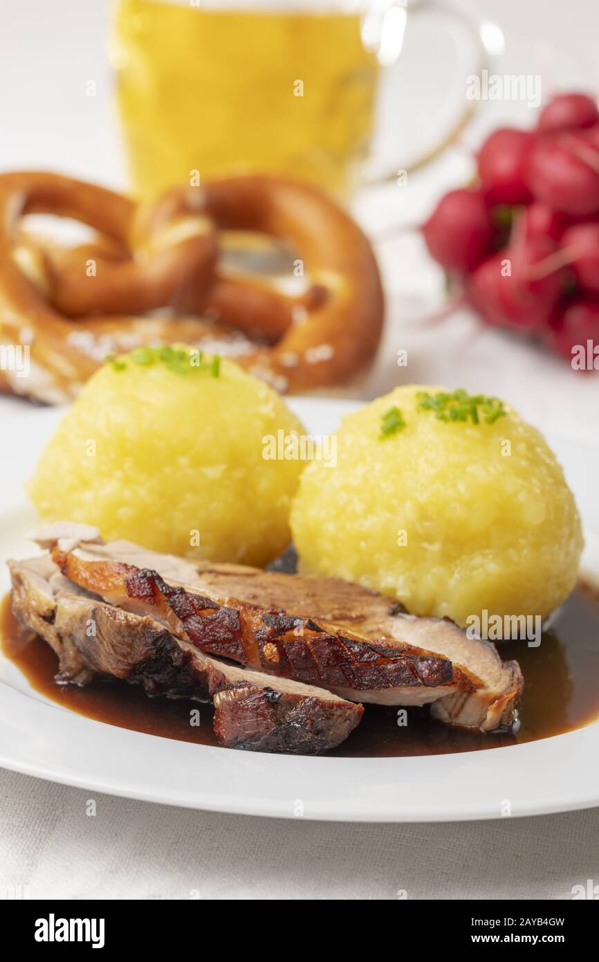 Bavarian roast pork with dumplings Stock Photo Alamy