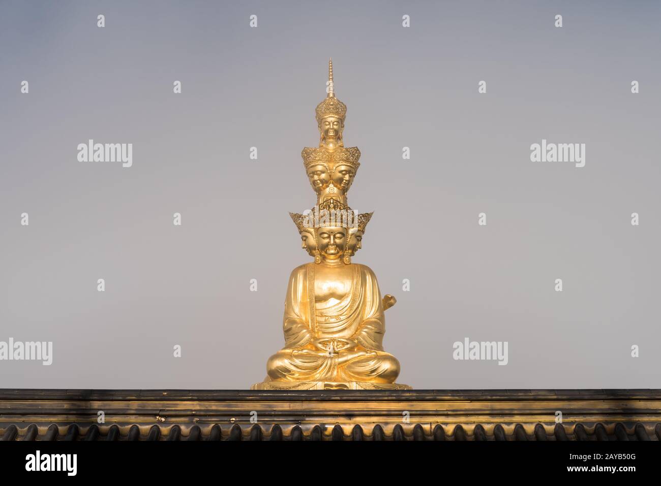 gold buddha in foggy background Stock Photo