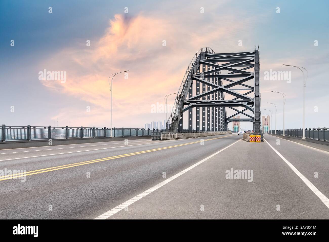steel bridge and road with dusk sky Stock Photo