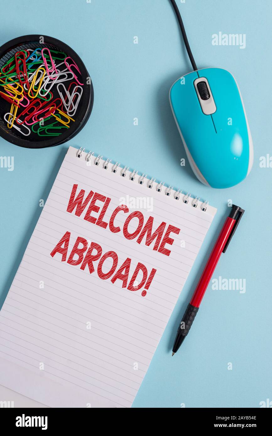 Text sign showing Welcome Abroad. Conceptual photo something that you say when someone gets on ship Notebook and writing equipme Stock Photo