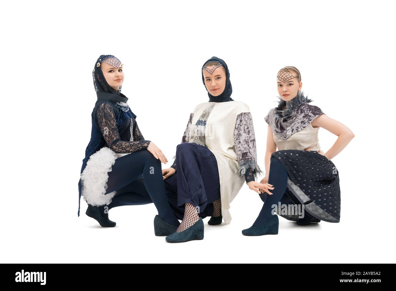 Pretty girls in design costumes shot Stock Photo - Alamy