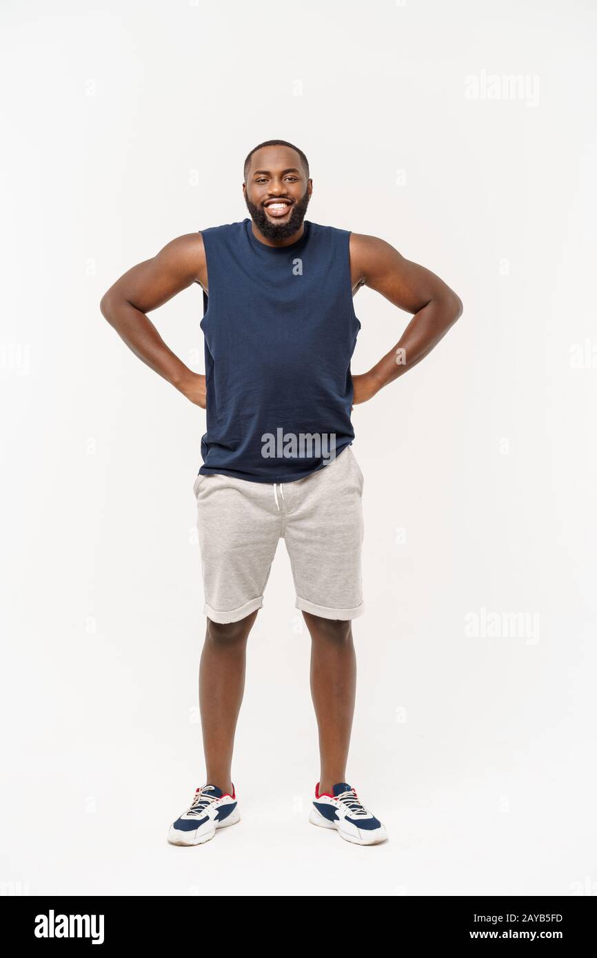 African sport man exercising and stretching on white background Stock ...