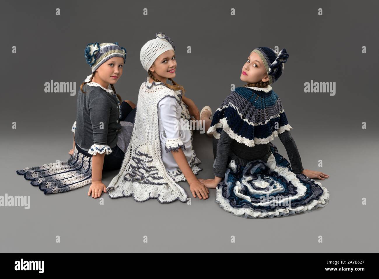 Pretty girls wearing original costumes and hats Stock Photo - Alamy