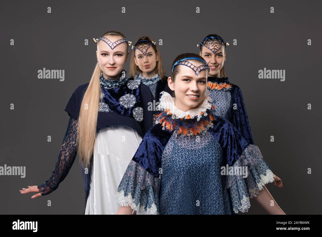 Shot of pretty girls in design dresses Stock Photo - Alamy