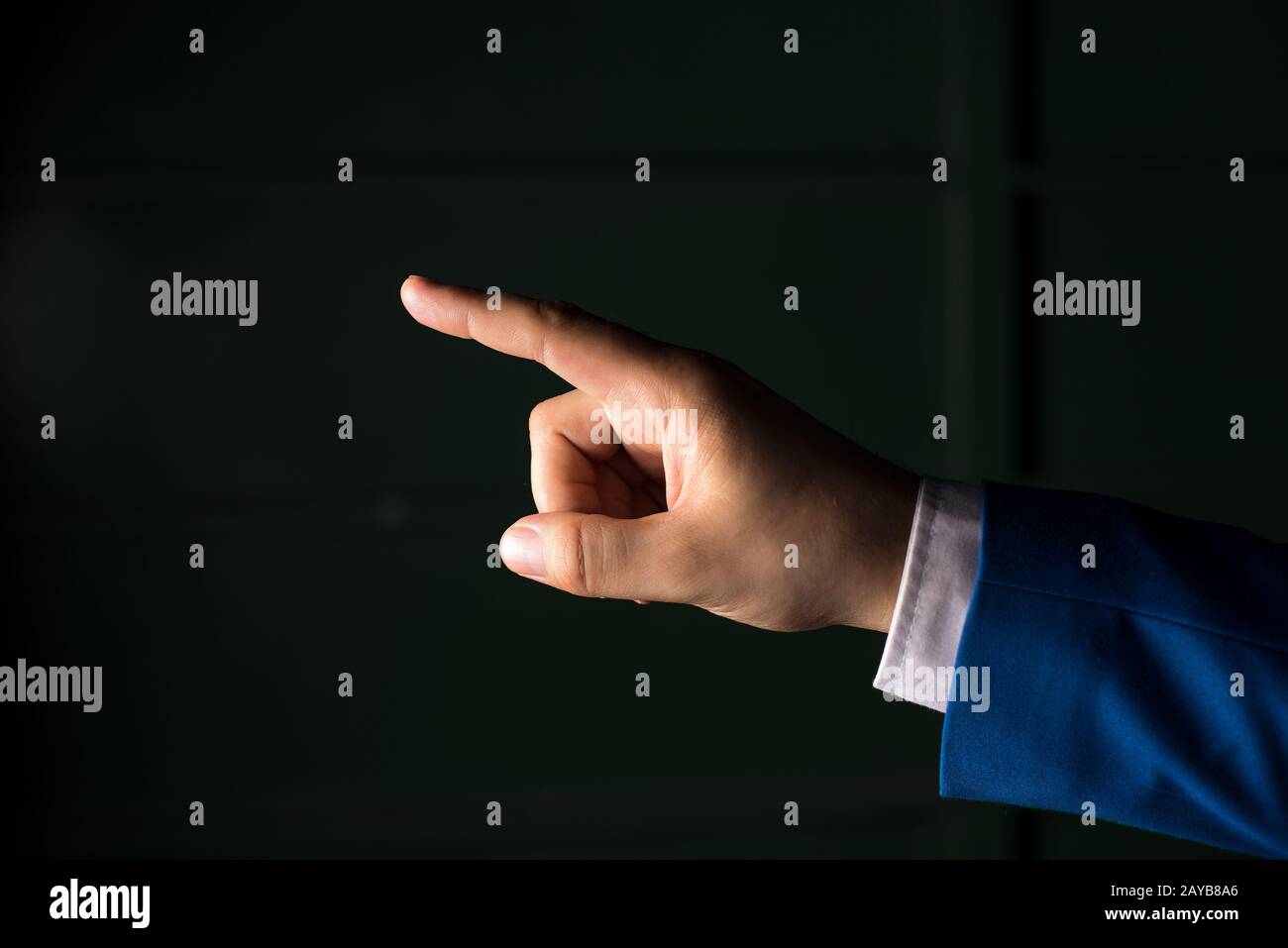 Black hand pointing hi-res stock photography and images - Alamy