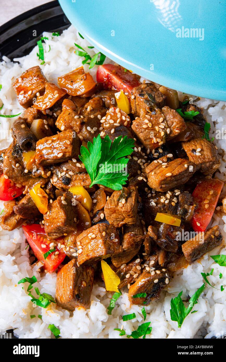 Tajin beef stew with rice paprika and sesame seeds Stock Photo Alamy