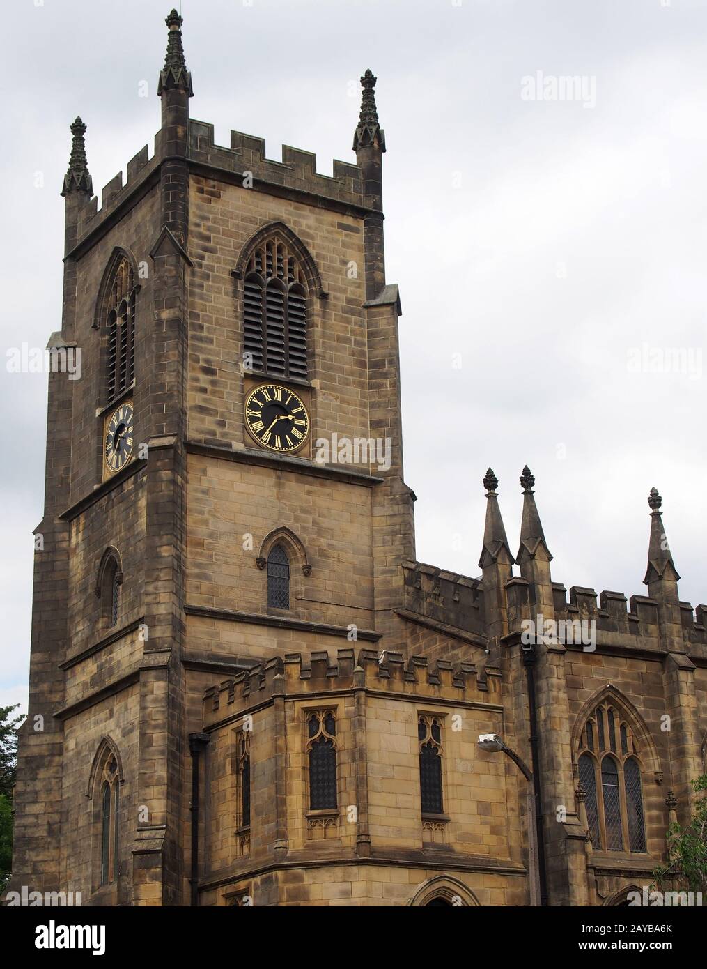 christ church in sowerby bridge west yorkshire built in a medieval style in 1821 with ornate stone work and clock tower Stock Photo