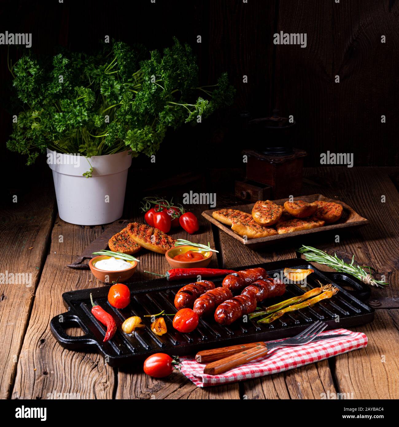 Chili chorizo sausage with tomato bruschetta Stock Photo - Alamy
